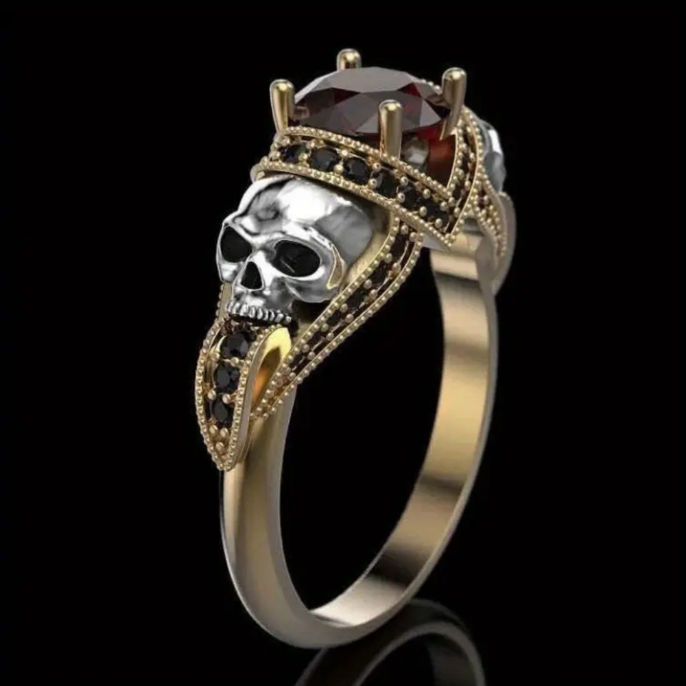 Gold and Silver Skull Ring with Red Gemstone